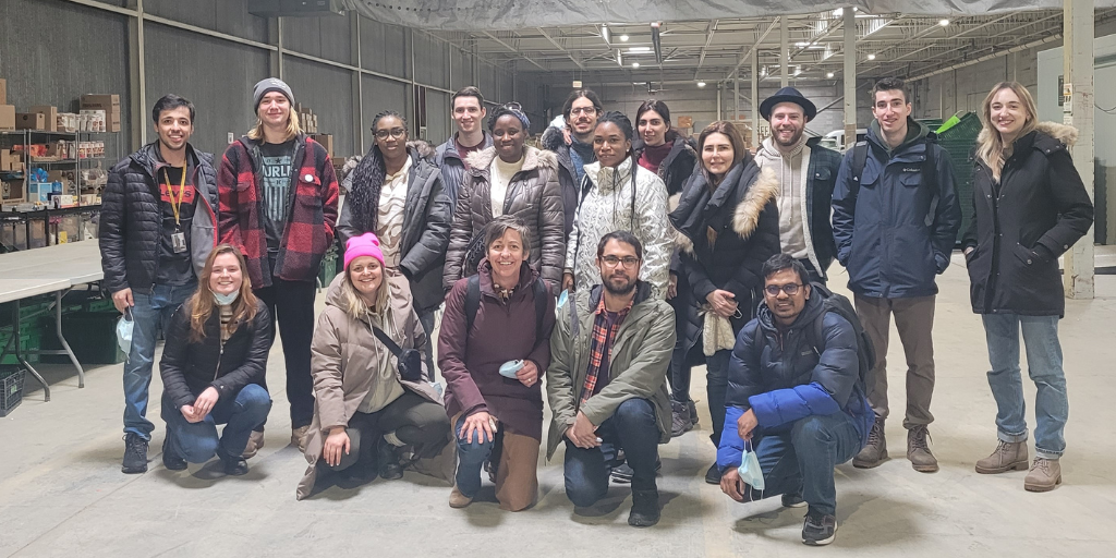 HQP and AFI scholars tour The SEED warehouse, a non-governmental organization in Guelph dedicated to addressing food insecurity in the region.